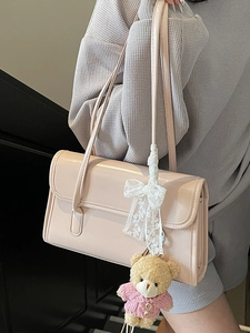 Borsa a spalla rosa in pelle PU con fiocco in pizzo bianco e ciondolo a orsetto