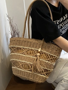 Bohemian hollow out straw tote bag with tassel pendant for summer beach vacation styling