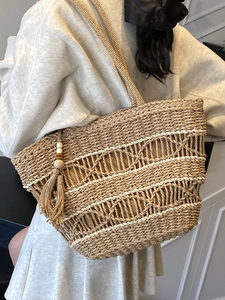 Bohemian hollow straw woven tote bag with wavy stripes and tassel charm for summer
