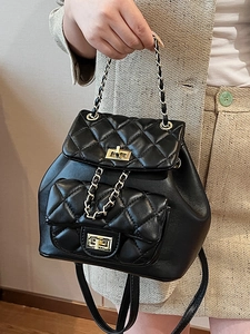 Elegant black quilted leather backpack with gold chain handle and turn-lock closure