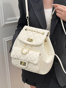 White quilted faux leather backpack with gold chain straps and elegant metal twist locks