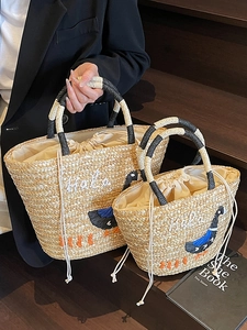Handmade woven straw tote bag set with Hello embroidery and contrast handle for beach vacation