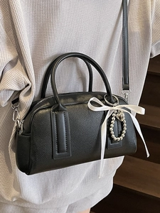 Chic black lychee grain Boston handbag with white bow ribbon and silver heart charm