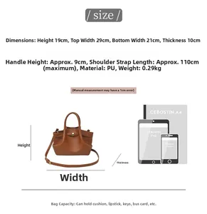 Size diagram of brown PU bucket bag with iPad and phone scale comparison chart