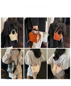 Detail shots of embossed crossbody bucket bags with cartoon patterns and tassel charms