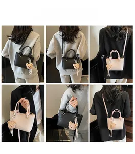 Detailed views of women's bucket bag in black and pink with teddy bear pendant charm