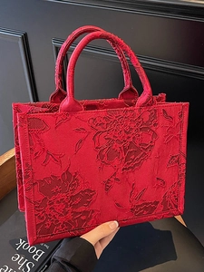 Elegant red floral embossed jacquard tote bag with dual handles for bridal use
