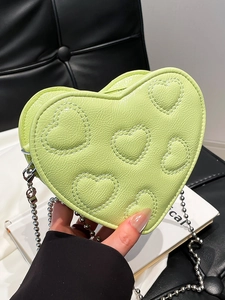 Avocado green heart-shaped quilted crossbody bag with silver bead chain strap