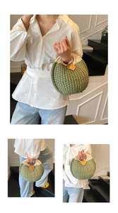 Detailed view of handmade green woven shell bag with white handle and leather charm