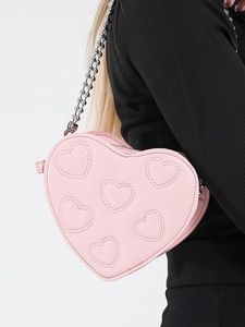 Pink heart-shaped crossbody bag with quilted embroidery and silver bead chain strap