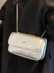Silver chain shoulder bag with V-quilted stitching and metallic finish for women