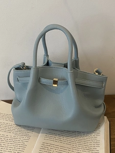 Minimalist light blue lychee pattern leather bucket bag with gold buckle and top handle