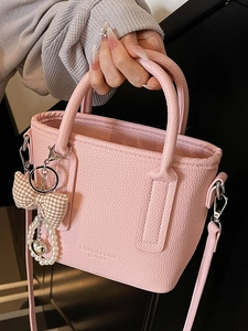 Rosa Handtasche aus Leder mit Litschi-Maserung und Schleifen-Perlenanhänger für Damen