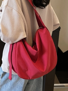 Large red hobo tote bag for women with adjustable wide strap for casual daily commuting