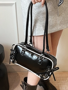 Borsa a cilindro retrò in vernice nera con profili bianchi a contrasto e fiocco