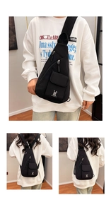 Detail view of black nylon chest bag with bunny logo and multiple functional zip pockets
