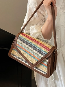 Chic rainbow straw weave crossbody bag with premium brown leather trim and shoulder strap
