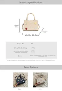 Détail de patchs en cœur colorés sur mini sac en similicuir avec poignées rigides