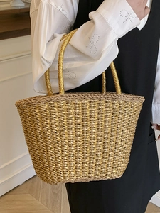 Elegante borsa tote in paglia intrecciata dorata per le vacanze estive con manico tondo