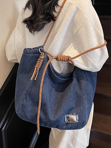 Stylish large denim tote bag with rope straps and vintage wash for women's daily use