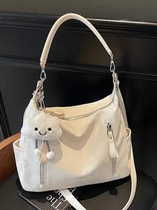 Sac fourre-tout beige minimaliste avec poches fonctionnelles et breloque nuage