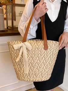 French style straw tote bag with brown leather handles and delicate lace ribbon decoration