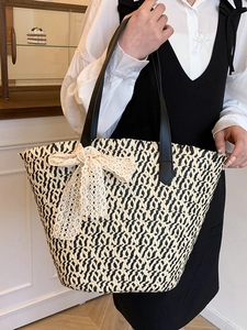 French style straw woven tote bag with lace bow and black leather straps for summer vacations