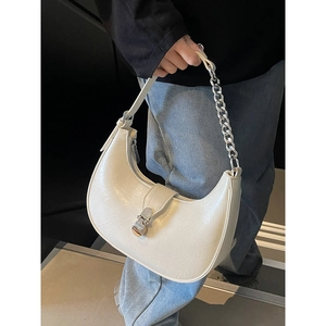 Creamy white crescent handbag with glossy textured PU leather and silver chain strap