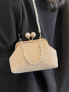 Beige straw woven clutch with oversized pearl clasp and long pearl strap for women