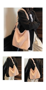 Detail of pink tote bag showing the ruffled shoulder strap and soft fabric texture