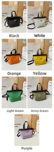 Seven colors of contrast-color nylon crossbody bags including black, white, and orange