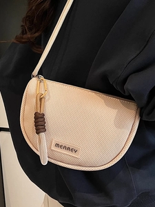 Chic beige mesh crossbody bag in half-moon design with sporty climbing rope accent
