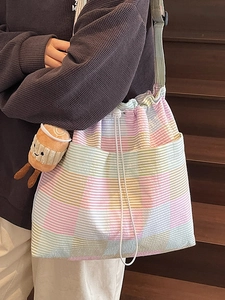 Chic striped canvas tote bag with drawstring closure and cute plush coffee cup charm
