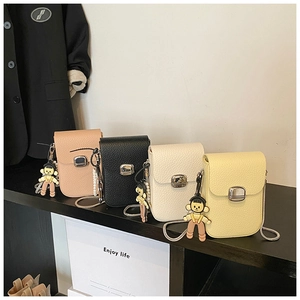 Litchi texture mini crossbody phone bags in four colors with pearl and doll charms