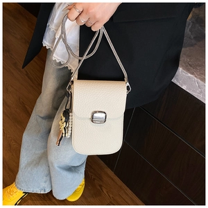 Crossbody phone bag in creamy litchi grain leather with silver chain and pearl charm