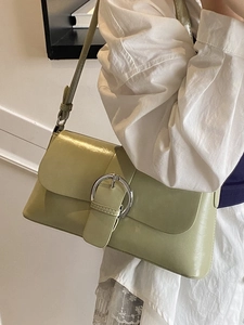 Chic avocado green oil wax leather shoulder bag with metallic buckle closure