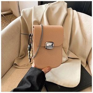 Close-up of litchi texture leather phone bag with silver buckle and pearl charm