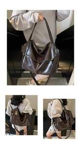 Detail of vintage oil wax leather tote bag with glossy texture and large capacity