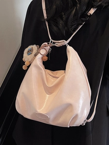 Sac cabas hobo en cuir souple rose avec bandoulière réglable et pendentif lion peluche