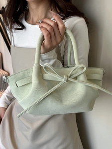 Sac sceau chic vert menthe en cuir avec nœud décoratif et texture cuir grainé