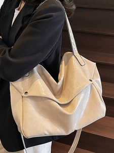 Vintage waxed leather tote bag in cream white with silver rivets and wide shoulder strap