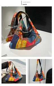 Detail of bohemian tote bag featuring colorful geometric patterns and fabric logo label