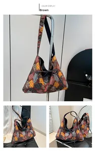 Macro detail of brown Bohemian tote bag featuring vintage patchwork print and tie closure
