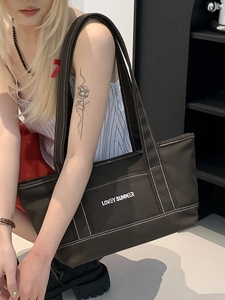 Minimalist black canvas tote bag with Lovey Summer print and white contrast stitching