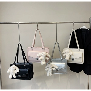 Minimalist glossy shoulder bags in four colors with cute white plush rabbit charms