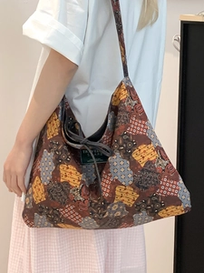 Ethnic patchwork tote bag with bohemian geometric patterns and large capacity design