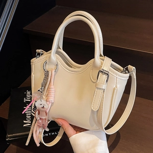 Bolso de Mano de Mujer de Cuero PU Moda Coreana Alta Gama Bolso de Hombro Cruzado Tipo Cubo Con Colgante de Perrito Diario