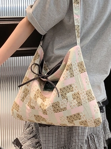 Ethnic style tote bag with pink and leopard print patchwork in hobo design