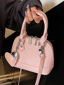 Pink PU leather shell handbag with heart pendant and detachable shoulder strap for women