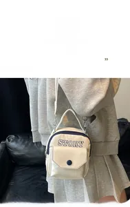 Mini sac bandoulière blanc cassé en cuir PU mat avec lettrage STORY et boucle en métal